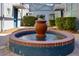 Beautiful fountain surrounded by manicured greenery, creating a serene focal point in the community's courtyard at 400 Village Ne Pkwy # 114, Atlanta, GA 30306