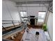Loft living area with a modern design, high ceilings, large windows, and unique architectural details at 400 Village Ne Pkwy # 114, Atlanta, GA 30306