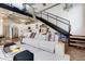 Spacious living area with an open floor plan, modern kitchen, and stylish furnishings at 400 Village Ne Pkwy # 114, Atlanta, GA 30306