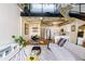 Open-concept living space with a view of the dining area and modern kitchen at 400 Village Ne Pkwy # 114, Atlanta, GA 30306