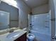 Bathroom with a single sink vanity and a shower-tub combo at 42 Champions Crossing, Villa Rica, GA 30180