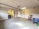 Well-lit garage with door and plenty of room for vehicles and storage at 42 Champions Crossing, Villa Rica, GA 30180