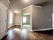 Open living area with hardwood floors and natural light at 42 Champions Crossing, Villa Rica, GA 30180