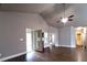 Spacious living room with vaulted ceiling and access to the back porch at 42 Champions Crossing, Villa Rica, GA 30180