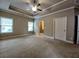 Large main bedroom with tray ceiling and ample natural light at 42 Champions Crossing, Villa Rica, GA 30180