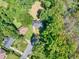 Overhead view of a single-story home featuring a large, lush backyard and mature trees at 1875 Creekside Ct, Decatur, GA 30032