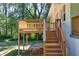 A close up view of the stairs and the deck made of brown wood at 1875 Creekside Ct, Decatur, GA 30032