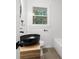 Updated bathroom featuring a vessel sink and modern fixtures at 1875 Creekside Ct, Decatur, GA 30032