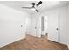 Bedroom featuring wood-look flooring and an open bathroom at 1875 Creekside Ct, Decatur, GA 30032