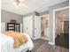 Bedroom showing view to bathroom and wood sliding door at 2541 Kickerillo Se Way, Atlanta, GA 30316