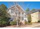 Attractive two-story home featuring a front porch and well-maintained landscaping at 2541 Kickerillo Se Way, Atlanta, GA 30316