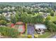 Aerial view of the tennis courts, pool, and community building at 4753 Outlook Ne Way, Marietta, GA 30066
