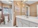 Bathroom with a white vanity and a shower-tub combo, offering a refreshing and clean design at 4753 Outlook Ne Way, Marietta, GA 30066