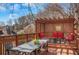 Inviting deck offering ample space for outdoor dining and relaxation with comfortable red seating at 4753 Outlook Ne Way, Marietta, GA 30066