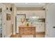 Functional kitchen featuring white cabinets, a modern island, and updated appliances at 4753 Outlook Ne Way, Marietta, GA 30066