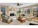 Bright and airy living room featuring a fireplace, neutral colors, and large windows for natural light at 4753 Outlook Ne Way, Marietta, GA 30066