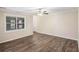 Bright living room boasts hardwood floors, natural light, and neutral walls at 6510 Connell Rd, Atlanta, GA 30349