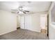 Spacious main bedroom includes neutral paint, ceiling fan, and adjoins the bath at 6510 Connell Rd, Atlanta, GA 30349