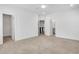 Spacious bedroom featuring carpet flooring, a ceiling fan, and an ensuite bathroom at 2239 Chestnut Pass, Decatur, GA 30033