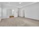 Large bedroom boasts a tray ceiling, ceiling fan, and doors to bathroom and stairs at 2239 Chestnut Pass, Decatur, GA 30033