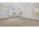 Bright bedroom with neutral carpet, recessed lights, and windows with blinds at 2239 Chestnut Pass, Decatur, GA 30033