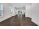 Bright living room with hardwood floors, fireplace, large windows providing natural light, and neutral color palette at 2239 Chestnut Pass, Decatur, GA 30033