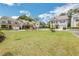 Exterior view of a residential neighborhood with green space and various home styles at 2239 Chestnut Pass, Decatur, GA 30033