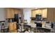 Well-equipped kitchen with stainless steel appliances, granite countertops, and custom cabinets at 3416 Haddon Hall Ct, Buford, GA 30519