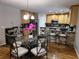 Charming kitchen with stainless appliances, granite counters and dining area at 3416 Haddon Hall Ct, Buford, GA 30519