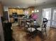 Spacious kitchen with stainless steel appliances and a view to the dining area at 3416 Haddon Hall Ct, Buford, GA 30519