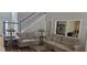 Comfortable living room with hardwood floors, neutral colors, and staircase at 3416 Haddon Hall Ct, Buford, GA 30519