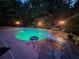 Swimming pool at night with LED lighting at 3416 Haddon Hall Ct, Buford, GA 30519