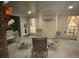 Covered back porch with comfortable seating, a ceiling fan, and a relaxing atmosphere at 828 Cedar Stream Ct, Loganville, GA 30052