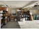 Garage interior with storage shelving for organization and tools at 828 Cedar Stream Ct, Loganville, GA 30052