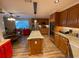 Spacious kitchen featuring granite countertops, stainless steel appliances, and a center island at 828 Cedar Stream Ct, Loganville, GA 30052