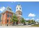 Historic courthouse featuring clock tower, brick facade, and classic architectural details at 1239 Pj East Rd, Covington, GA 30014