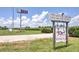 The Fox Winery sign, landscape, and vineyard showcase the estate's charm at 1239 Pj East Rd, Covington, GA 30014