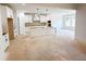 Modern kitchen featuring white cabinetry, an island, and stainless steel appliances at 1239 Pj East Rd, Covington, GA 30014