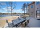 Inviting back deck with outdoor seating and scenic lake views, perfect for relaxing and entertaining at 1401 Rainey Rd, Temple, GA 30179