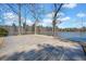 Outdoor patio with lake view, perfect for enjoying the serene surroundings at 1401 Rainey Rd, Temple, GA 30179