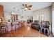 Open concept kitchen and breakfast nook with granite countertops and a view of the TV room at 1401 Rainey Rd, Temple, GA 30179