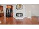 Corner of kitchen features black stainless refrigerator and decorative accent at 1401 Rainey Rd, Temple, GA 30179