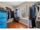 Walk-in closet with built-in shelving and a window offering natural light at 1401 Rainey Rd, Temple, GA 30179