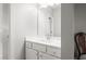 Bathroom featuring a white vanity and sink with a large mirror and vanity lights at 384 Carmichael Cir, Canton, GA 30115