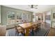 Inviting dining room featuring large windows offering natural light and backyard views at 1225 W Wesley Nw Rd, Atlanta, GA 30327