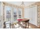 Eat-in kitchen nook with lots of natural light from large windows at 1370 Wheatfield Dr, Lawrenceville, GA 30043