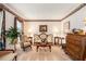 Cozy living room featuring a loveseat, decorative accents, and traditional furnishings at 1370 Wheatfield Dr, Lawrenceville, GA 30043