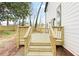 New wood deck with stairs to grade at 1650 Eastport Se Ter, Atlanta, GA 30317