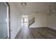 Foyer area with hardwood floors, chandelier lighting, and stairs at 2453 Osceola Rd, Lithonia, GA 30058