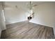 Spacious living room with new hardwood floors and staircase at 2453 Osceola Rd, Lithonia, GA 30058